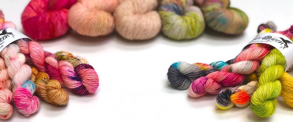 Photo of multicoloured hand dyed yarns in large and mini skeins